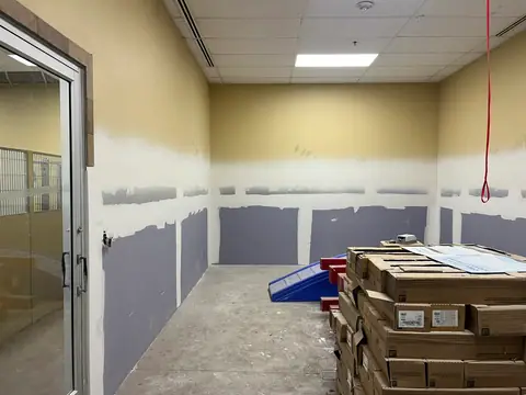 Before, old finish off, walls patched (Dog Daycare Tile, Littleton)