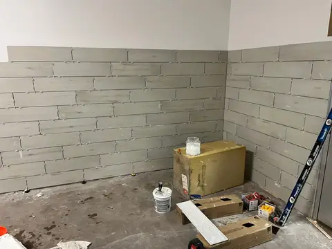 Plank tile going up (Dog Daycare Tile, Littleton)