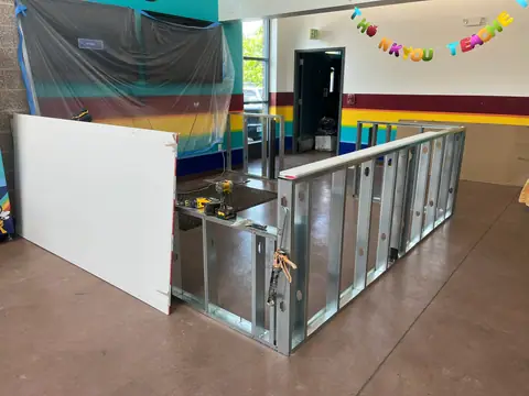 Framing the new front counter (School Office Refresh, Northwest Denver)